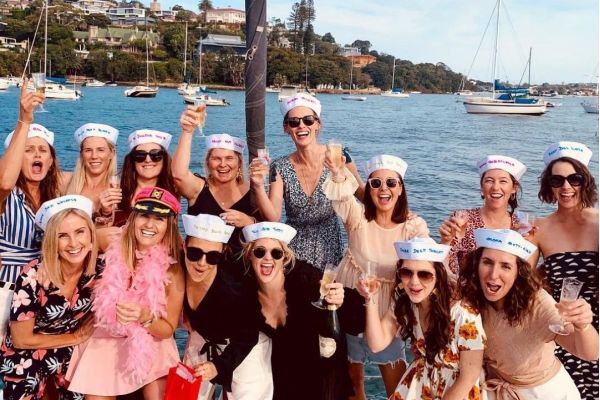 Hens boat party Sydney Harbour girls with sailor hats