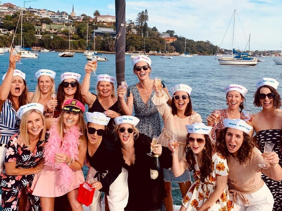 Hens boat party Sydney Harbour girls with sailor hats