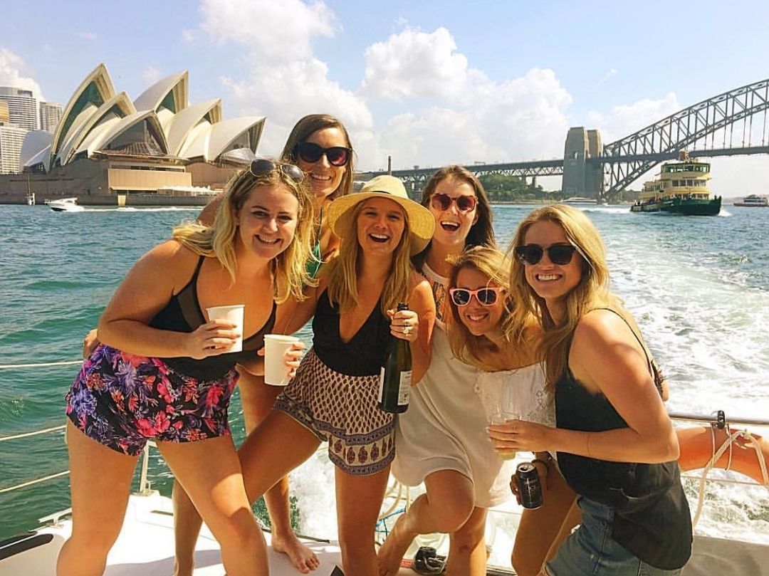 Private boat party Sydney girls having fun with Opera House in background